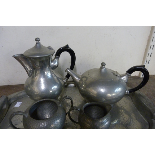 331 - An Arts and Crafts pewter coffee set with tray