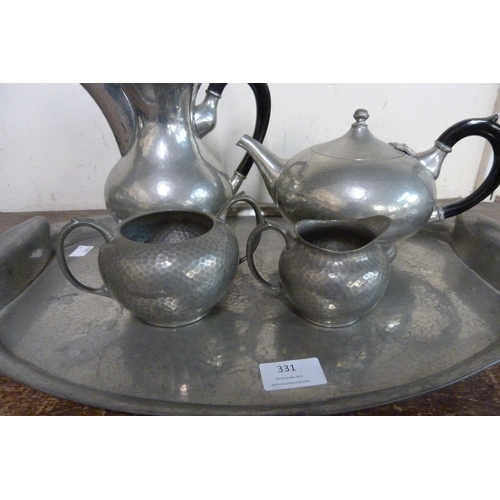 331 - An Arts and Crafts pewter coffee set with tray