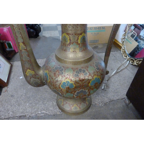 336 - A large Persian gilt metal floor standing ewer