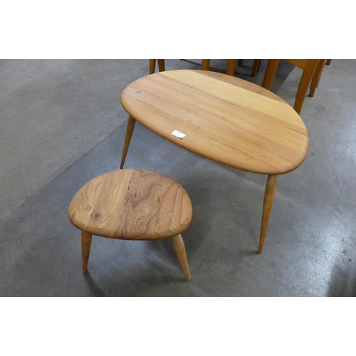 48 - An Ercol elm and beech pebble shaped nest of two tables