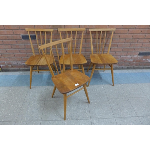 49 - A set of four Ercol elm and beech 391 model chairs