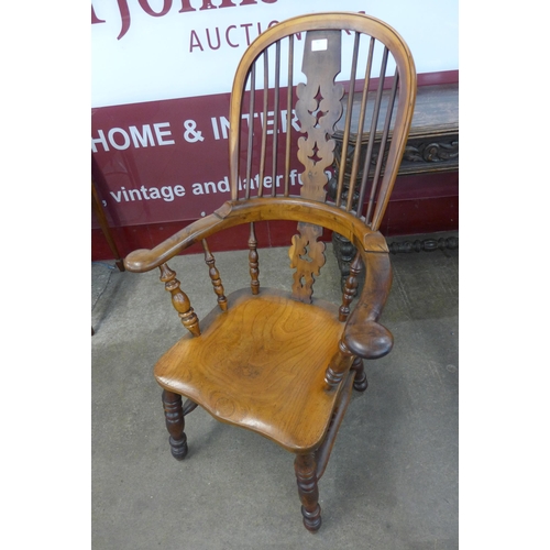 62 - A 19th Century elm and yew wood highback Windsor chair