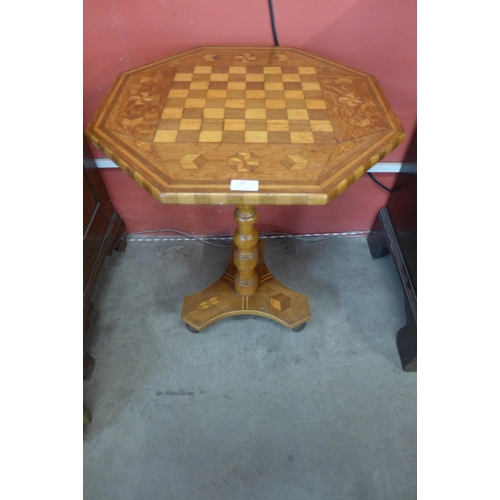66 - A 19th Century Italian inlaid walnut octagonal tilt-top games table