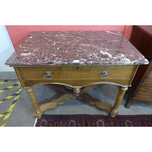 69 - A 19th Century Dutch walnut and marble topped single drawer console table