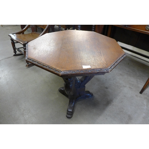 97 - A 19th Century Italian Baroque Revival carved oak octagonal centre table