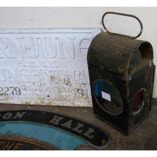 295 - A railway lamp and assorted railway plaques