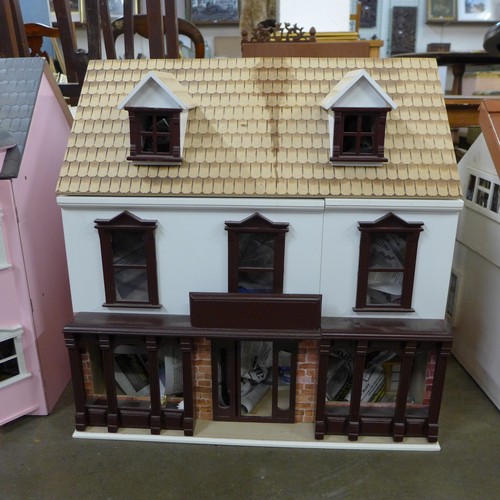 350 - A painted doll's house and accessories