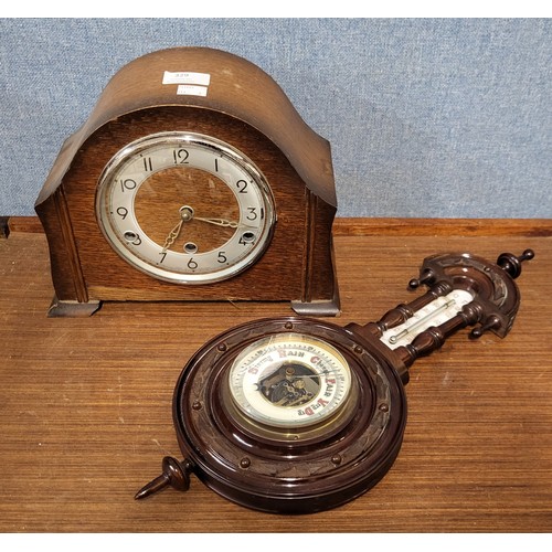 329 - An oak mantel clock and a walnut aneroid barometer