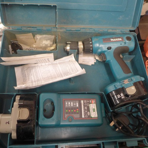2001 - A Bosch GST 60PB 520w jigsaw with A Makita 6347D drill and charger and two batteries