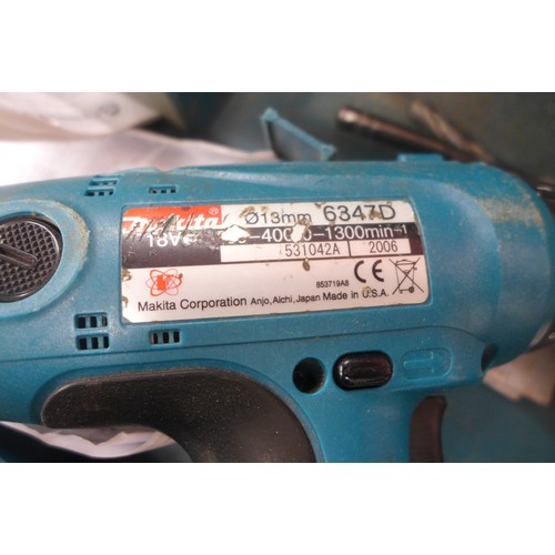 2001 - A Bosch GST 60PB 520w jigsaw with A Makita 6347D drill and charger and two batteries