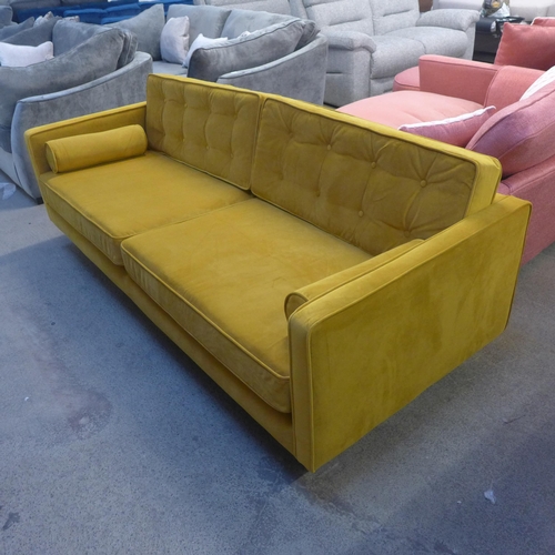 1496 - A mustard velvet upholstered mid-Century style three seater sofa