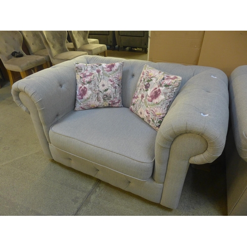 1499 - A grey textured weave upholstered love seat