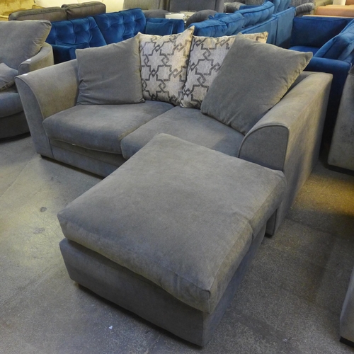 1500 - A mid-grey upholstered 2.5 seater sofa with patterned scatter cushions