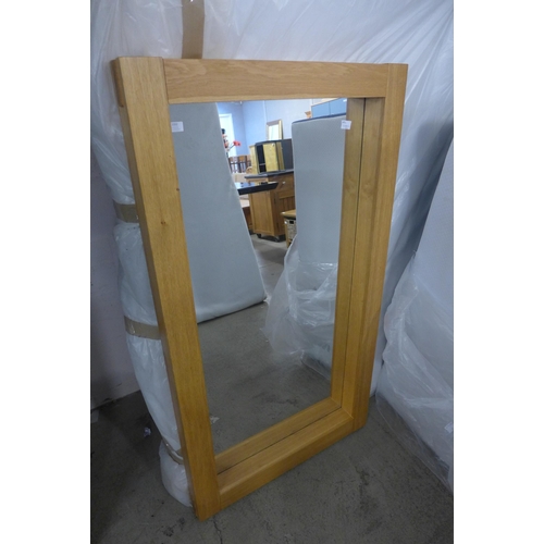 1552 - A large oak framed mirror