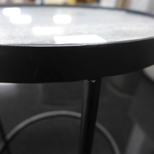 1565 - A black metal and granite circular industrial style lamp table/pot stand, damaged