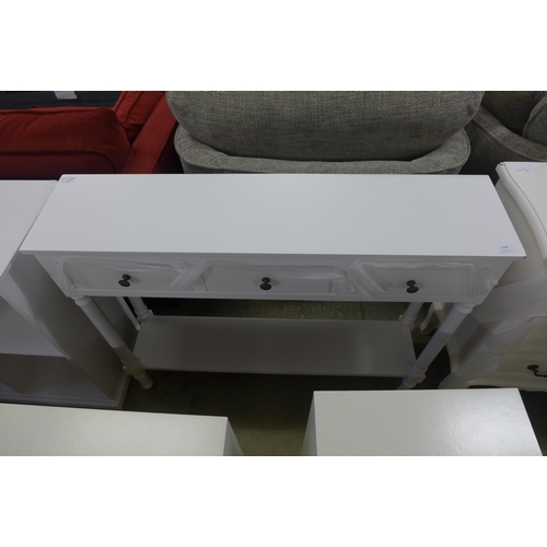 1568 - A white three drawer console table