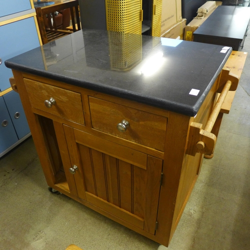 1593 - An oak and granite kitchen island unit