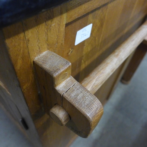 1593 - An oak and granite kitchen island unit