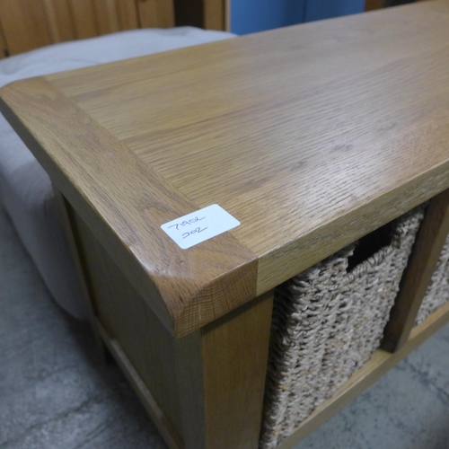 1596 - An oak three basket unit