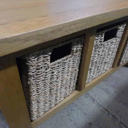 1596 - An oak three basket unit