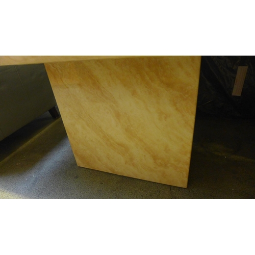 1616 - A cream marble effect dining table