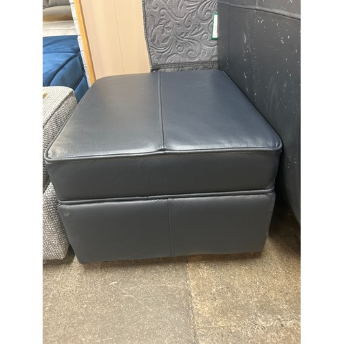 1490 - A Hoxton dark blue leather loveseat and footstool