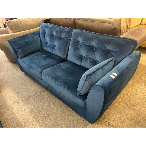 1509 - A Hoxton blue velvet upholstered two seater sofa (damaged frame)