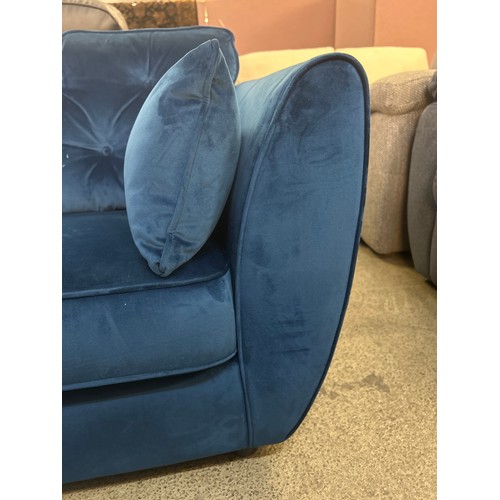 1509 - A Hoxton blue velvet upholstered two seater sofa (damaged frame)