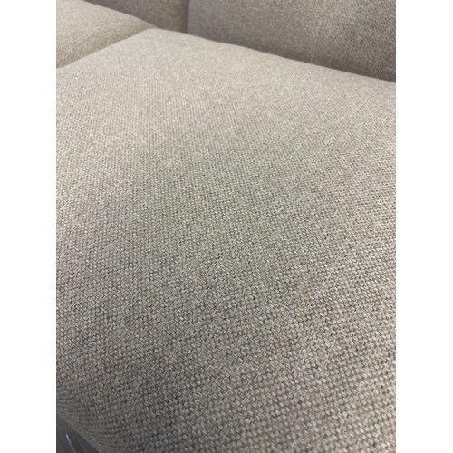 1529 - An oatmeal textured weave upholstered two seater sofa bed