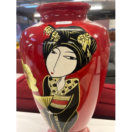 1573 - A large red Chinese vase depicting a lady