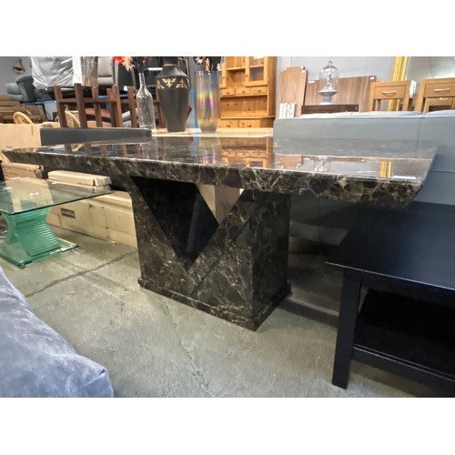 1585 - A mocha marble effect dining table with V shaped base