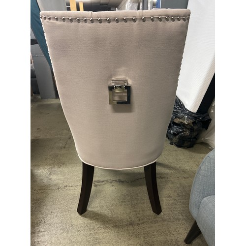 1598 - A linen upholstered buttoned side chair