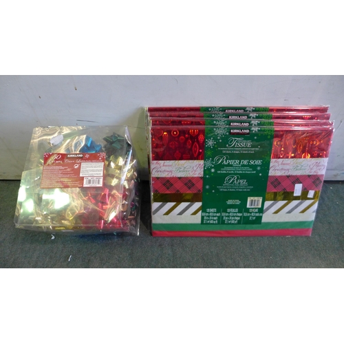 3115 - Four packs of printed gift tissue (120 sheets in each) and a box of 50 gift bows