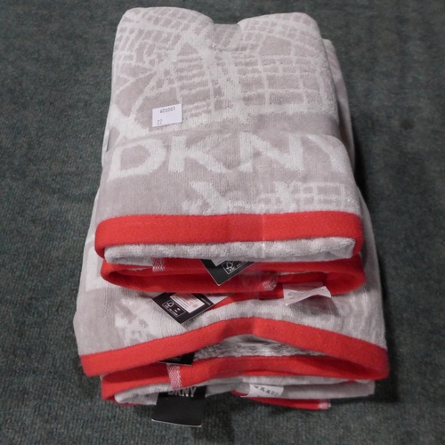 3280 - A set of four light grey and red DKNY City Map towels - 2 bath towels and two hand towels * this lot... 