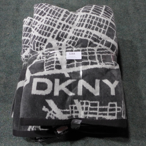 3284 - Set of three dark grey DKNY City Map towels, one bath sheet and two bath towels * this lot is subjec... 