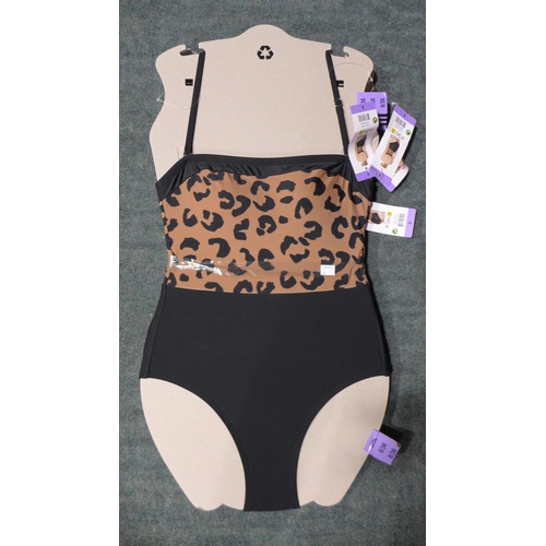 3311 - Four black and leopard print DKNY swimming costumes - size 8 * this lot is subject to VAT