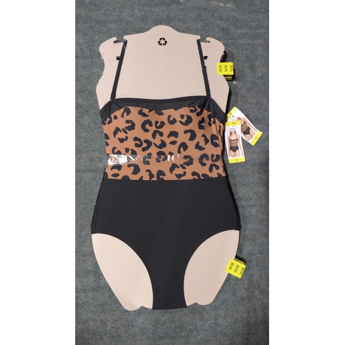 3315 - Four black and leopard print DKNY swimming costumes - size 10 * this lot is subject to VAT