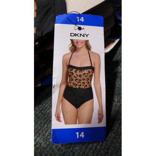 3320 - Five black and leopard print DKNY swimming costumes - size 14 * this lot is subject to VAT