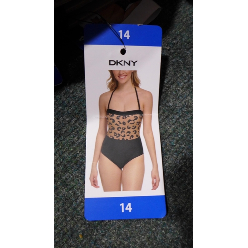 3321 - Five black and leopard DKNY swimming costumes - mixed size (4 x 14 & 1 x 16) * this lot is subject t... 