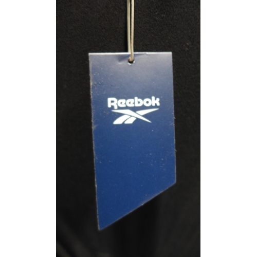 3325 - Five black and white Reebok swimming costumes - size L * this lot is subject to VAT