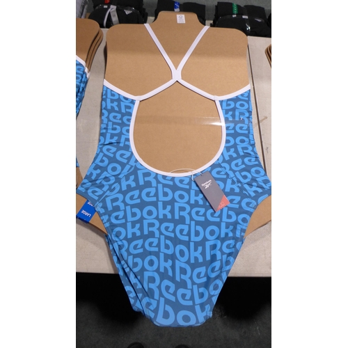 3329 - Five blue Reebok swimming costumes - size L * this lot is subject to VAT