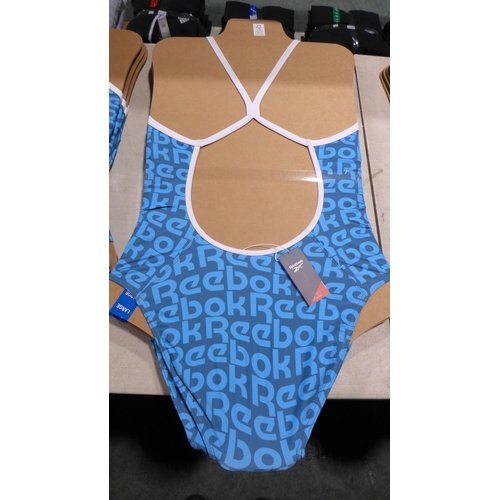 3330 - Five blue Reebok swimming costumes - size L * this lot is subject to VAT