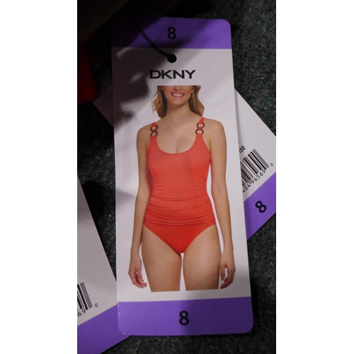 3335 - Five coral pink DKNY swimming costumes - size 8 * this lot is subject to VAT