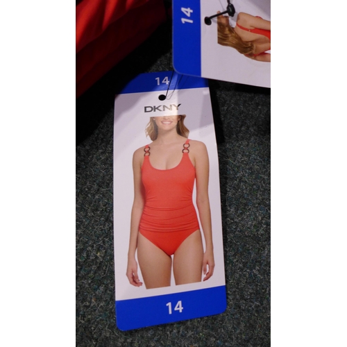 3339 - Five coral pink DKNY swimming costumes - size 14 * this lot is subject to VAT