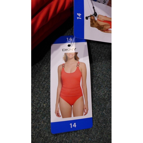 3341 - Five coral pink DKNY swimming costumes - size 14 * this lot is subject to VAT