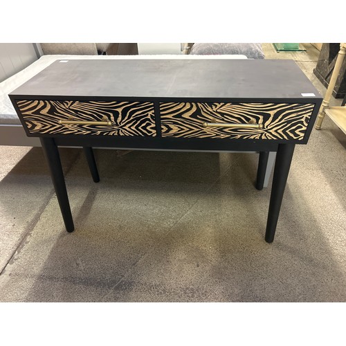 1580 - A zebra effect console table