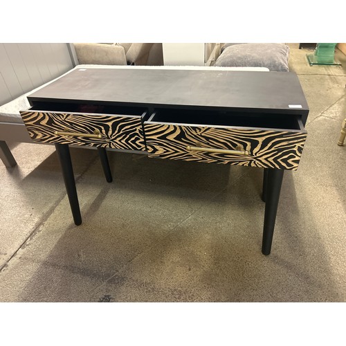 1580 - A zebra effect console table