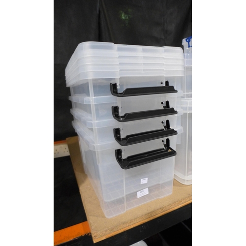 3512 - Four plastic lidded storage boxes