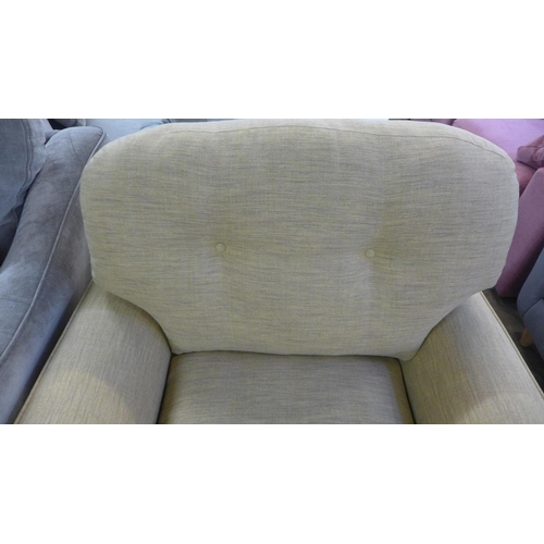 1310 - A Dijon flecked fabric upholstered oversized armchair