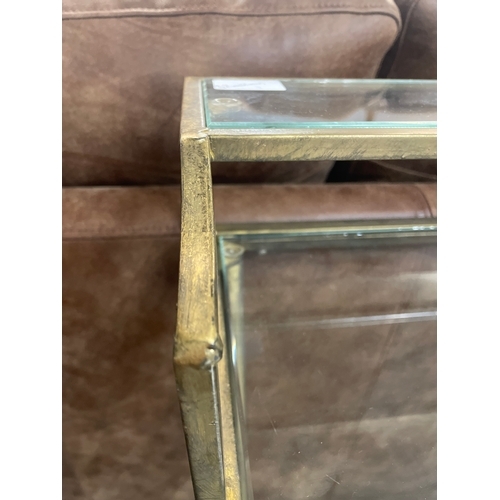 1325 - A gold coloured metal and glass desk